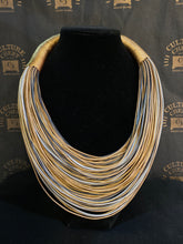 Load image into Gallery viewer, Grey and Gold Colombian Necklaces
