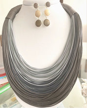 Load image into Gallery viewer, Grey and Gold Colombian Necklaces
